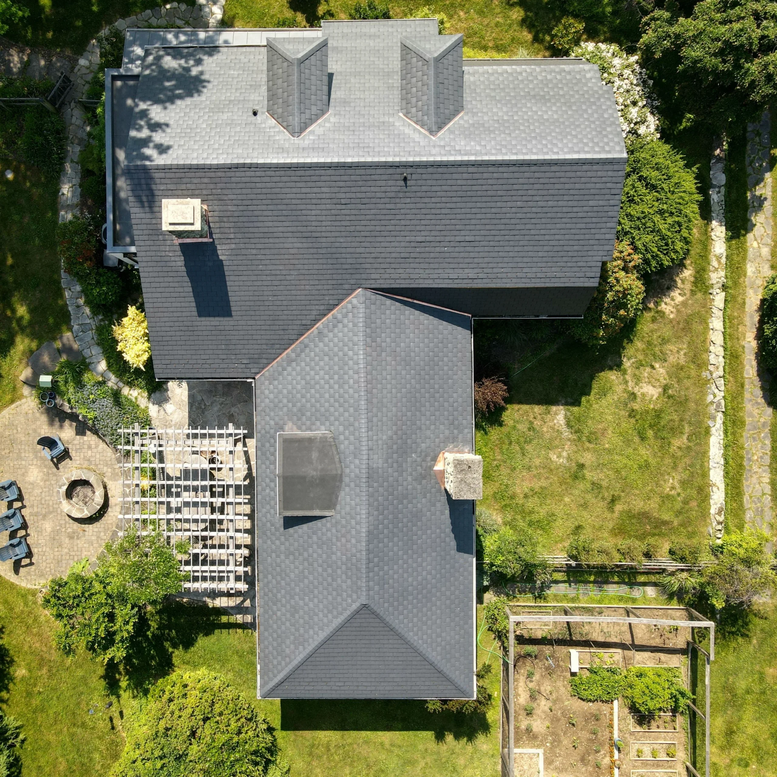 Completed roof by Bravo Roofing on a Maryland home, photographed from above