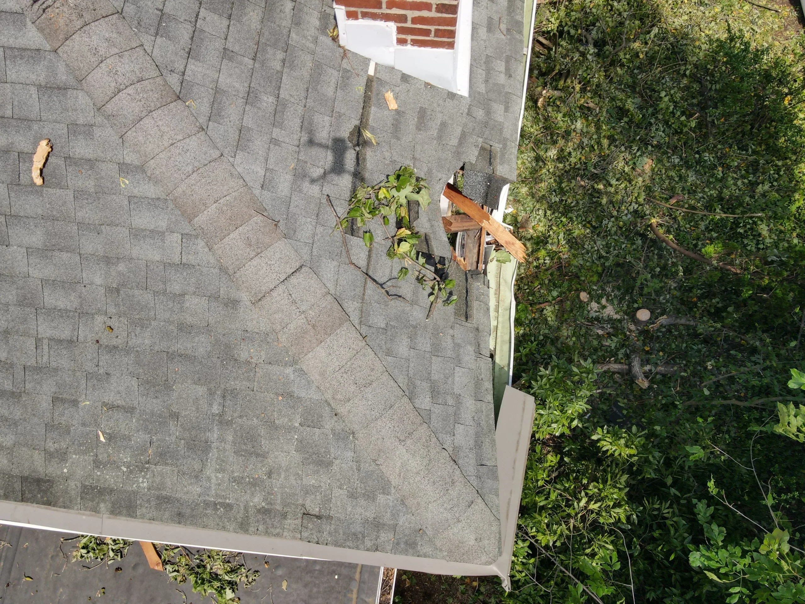 Completed roof by Bravo Roofing on a Maryland home, photographed from above