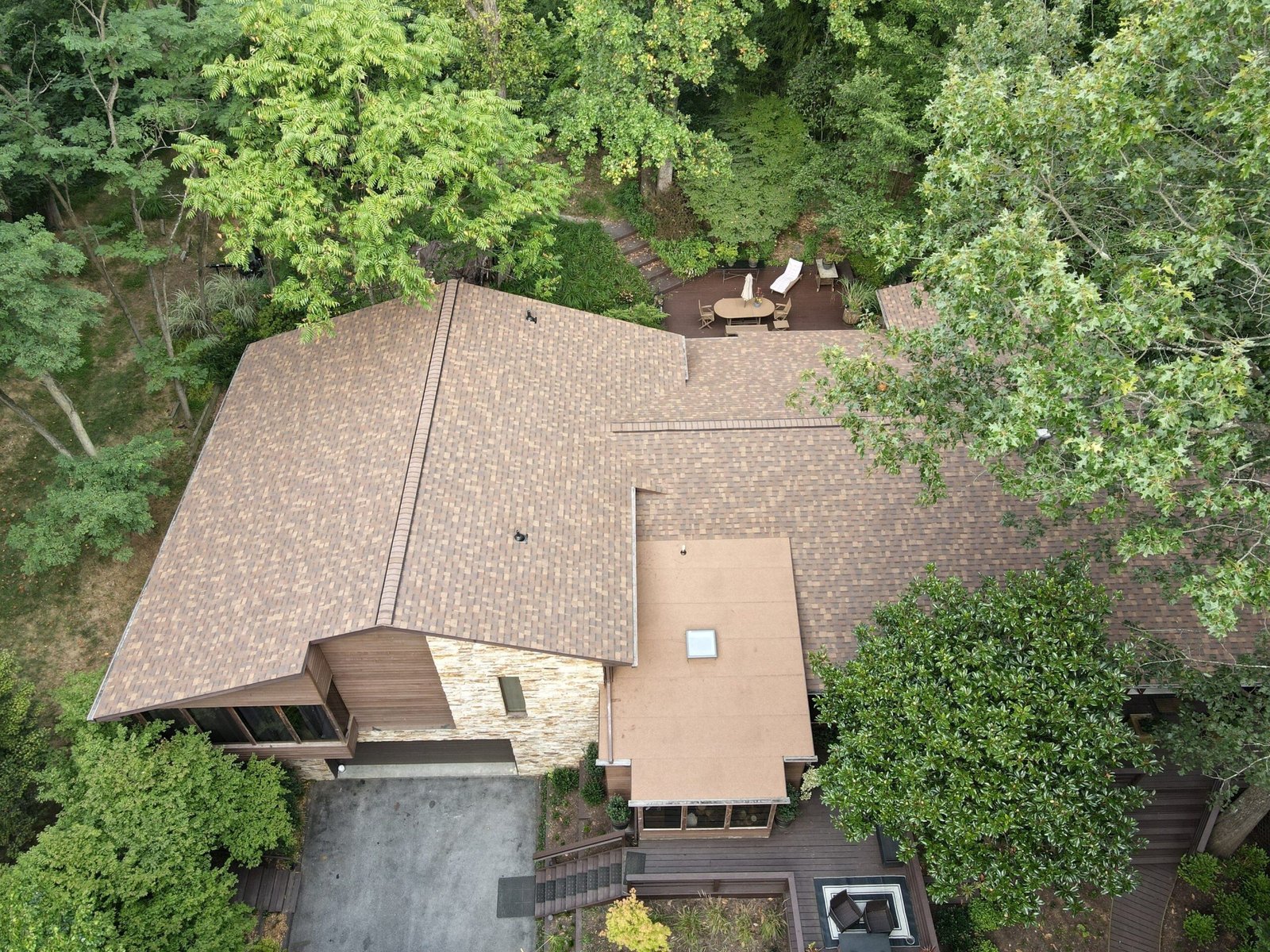 Completed roof by Bravo Roofing on a Maryland home, photographed from above