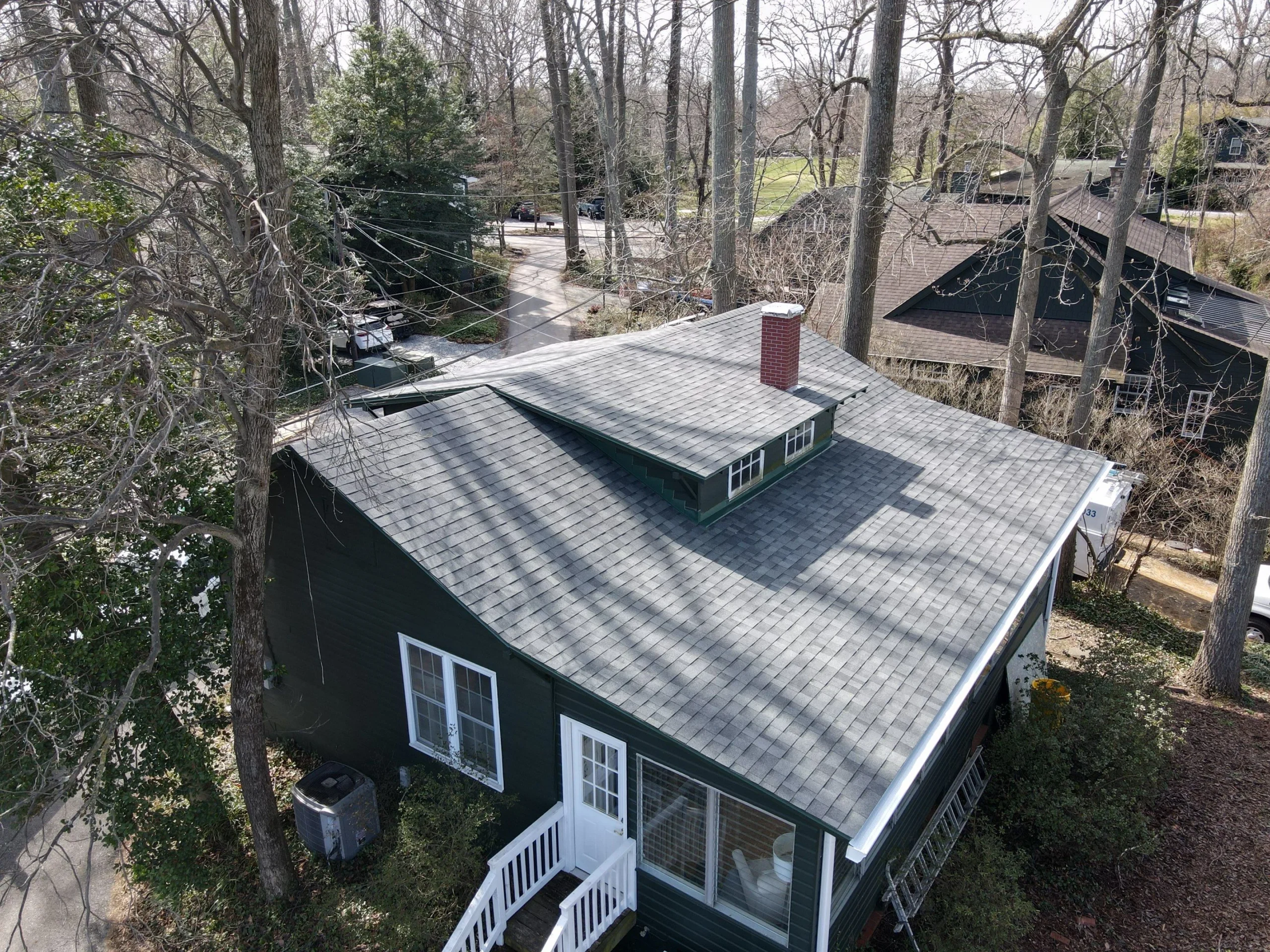 Completed roof by Bravo Roofing on a Maryland home, photographed from above