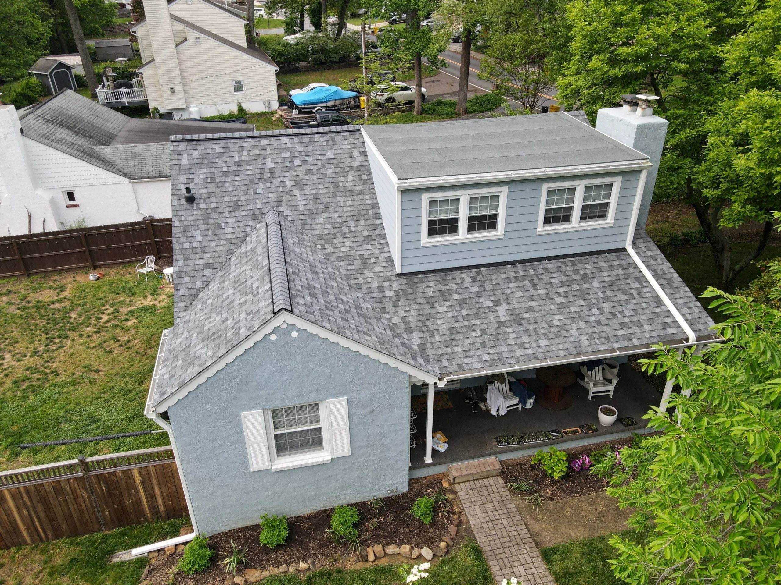 Completed roof by Bravo Roofing on a Maryland home, photographed from above