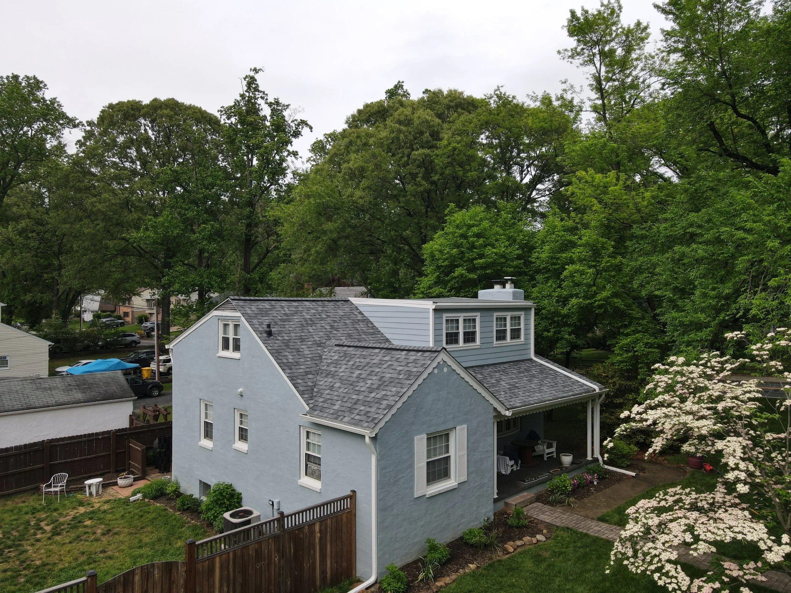 Completed roof by Bravo Roofing on a Maryland home, photographed from above