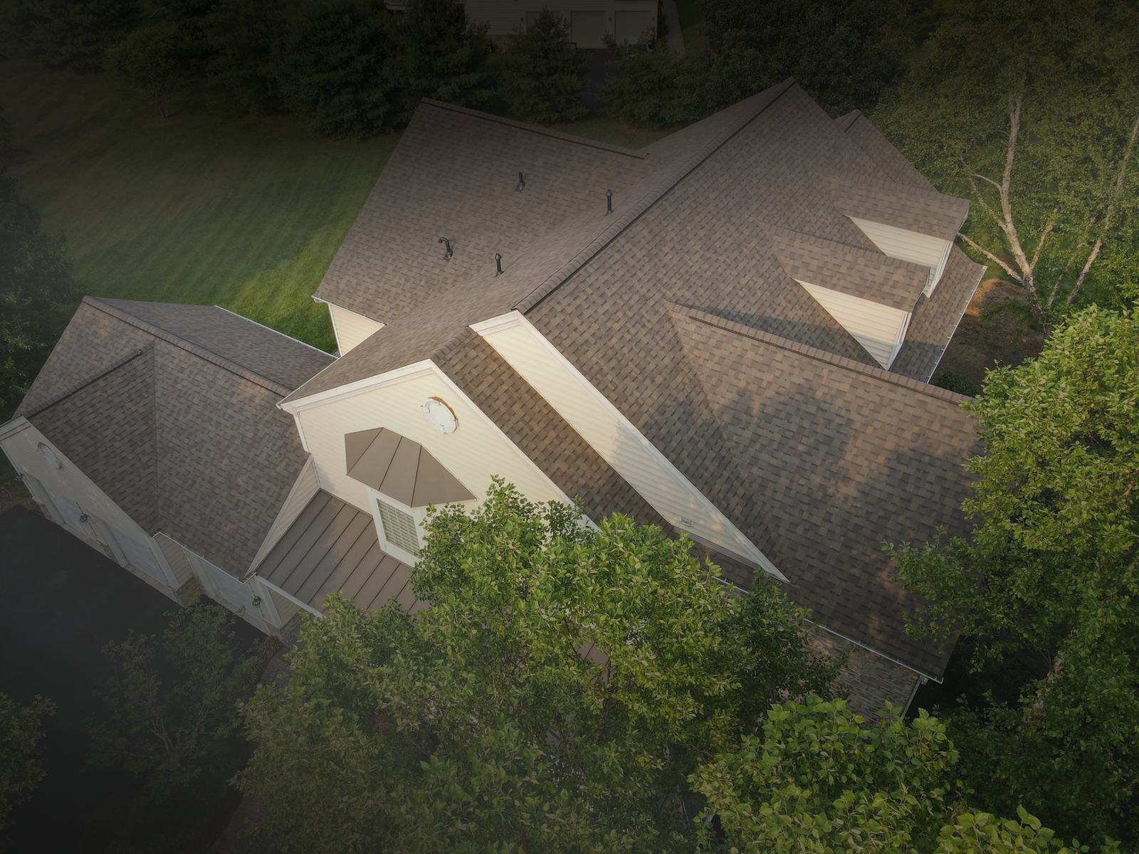 Completed roof by Bravo Roofing on a Maryland home, photographed from above