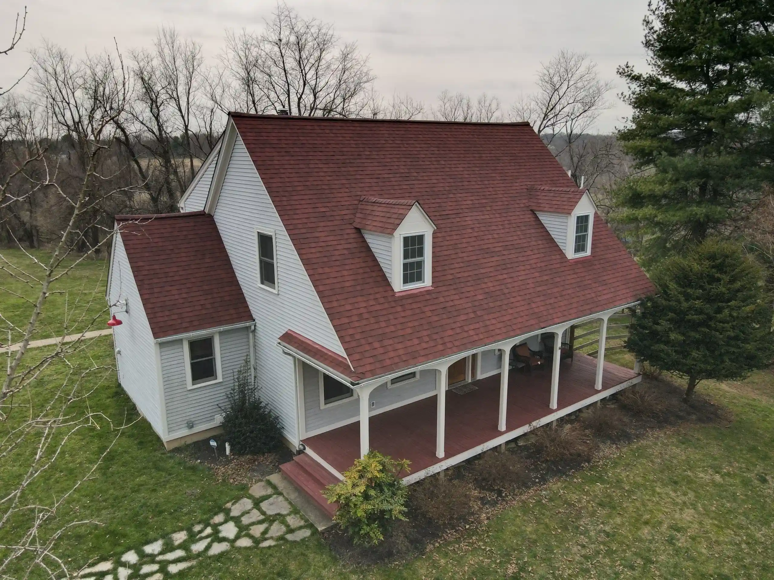 Completed roof by Bravo Roofing on a Maryland home, photographed from above