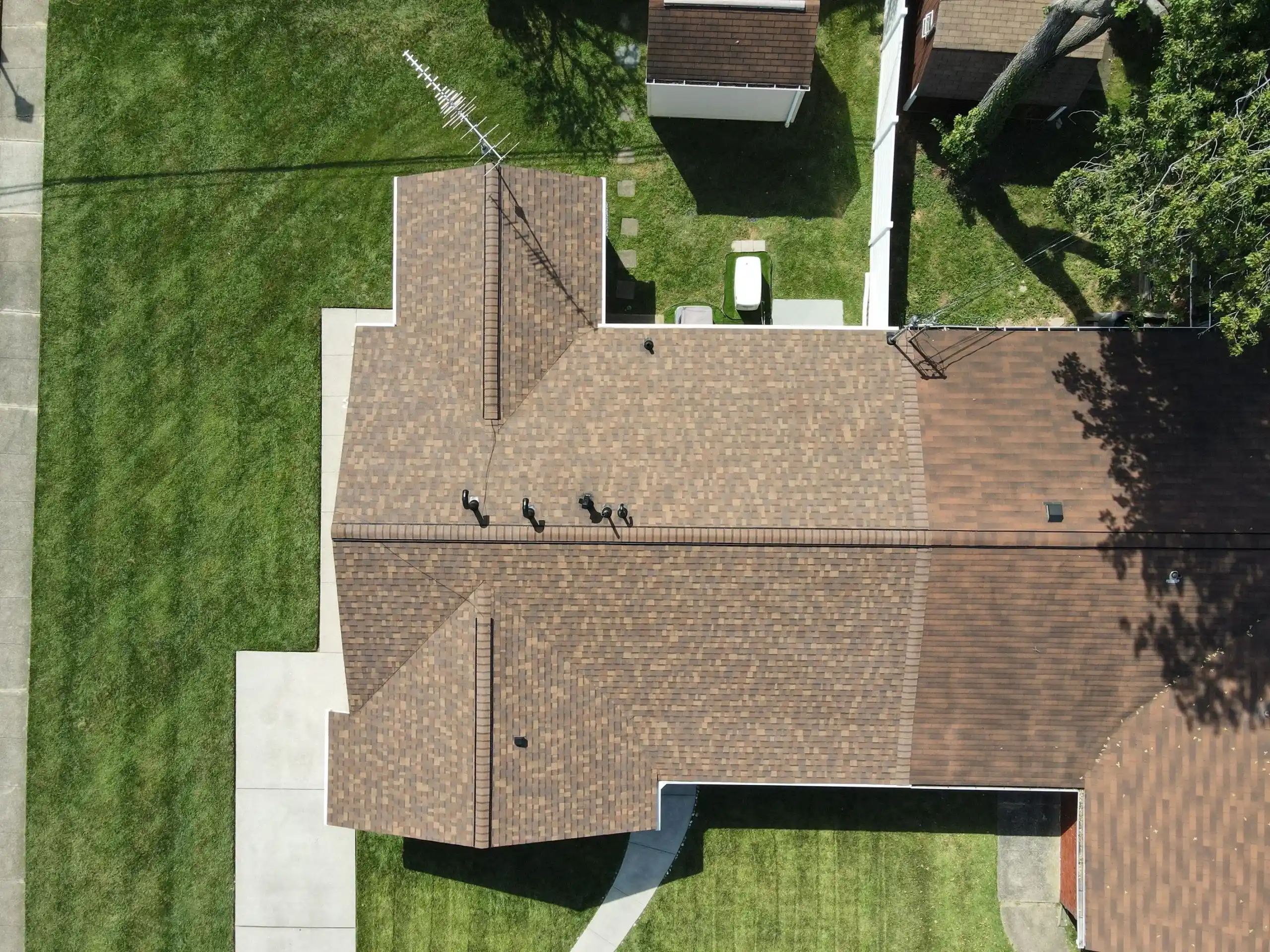 Completed roof by Bravo Roofing on a Maryland home, photographed from above